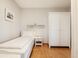 Schlafzimmer mit zwei Einzelbetten